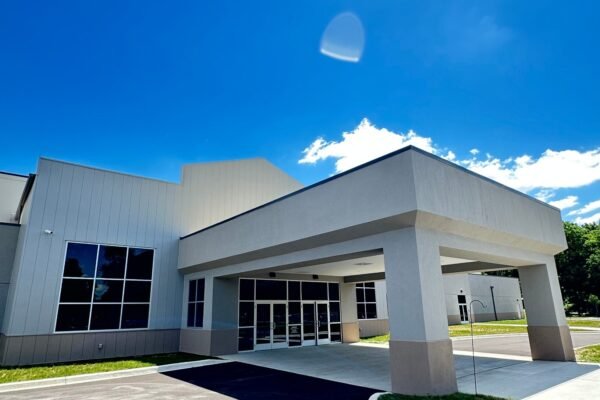 Covered entrance canopy and glass doors at Ninth & O Baptist Church in Louisville, Kentucky