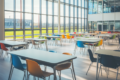 school design architecture with tall windows and open workspaces