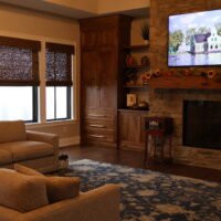 sitting area with couch facing towards wall-mounted tv