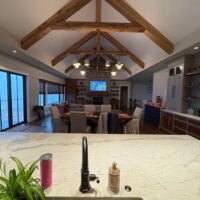 view of dining table and living room from the kitchen island