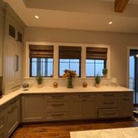 section of kitchen with windows