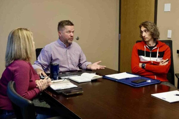 commercial building architects meeting with property owner